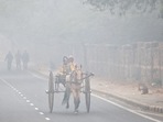 Commuters on Vande Mataram Marg on Tuesday morning. (Sanchit Khanna/HT Photo) Commuters on Vande Mataram Marg on Tuesday morning. (Sanchit Khanna/HT Photo)