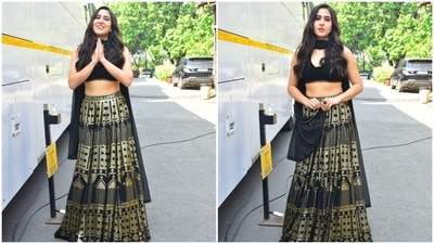 Sara Ali Khan teamed her black and golden lehenga with a black sleeveless blouse and a dupatta. (HT Photo/Varinder Chawla) Sara Ali Khan teamed her black and golden lehenga with a black sleeveless blouse and a dupatta. (HT Photo/Varinder Chawla)