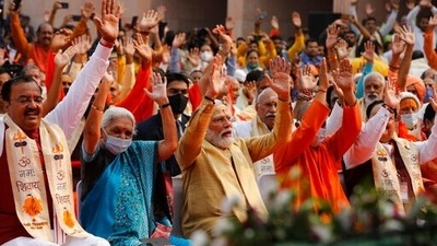 Prime Minister Narendra Modi with other dignitaries attend the inauguration of Kashi Vishwanath Dham Corridor, a promenade that connects the sacred Ganges River with the centuries-old temple dedicated to Lord Shiva in Varanasi on December 13. (AP) Prime Minister Narendra Modi with other dignitaries attend the inauguration of Kashi Vishwanath Dham Corridor, a promenade that connects the sacred Ganges River with the centuries-old temple dedicated to Lord Shiva in Varanasi on December 13. (AP)