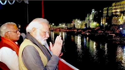PM Modi boarded the Swami Vivekananda cruise at Sant Ravidas Ghat to witness the evening 'aarti' on the banks of river Ganga. (PTI) PM Modi boarded the Swami Vivekananda cruise at Sant Ravidas Ghat to witness the evening 'aarti' on the banks of river Ganga. (PTI)