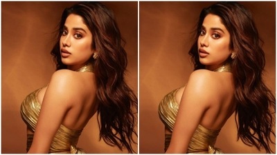 Janhvi picked a golden ensemble for the photoshoot. (Instagram/@janhvikapoor)