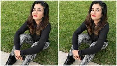 Raveena left her coloured tresses open and held in place with a mini hairclip. (Instagram/@officialraveenatandon)