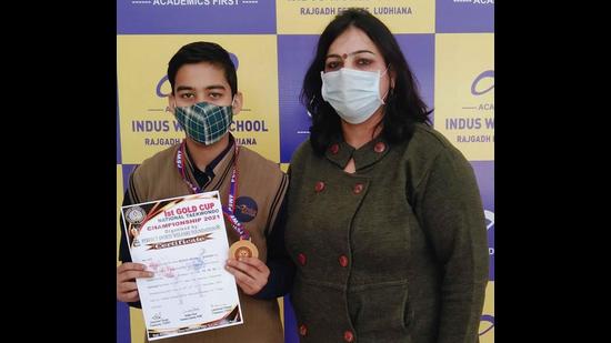 The winner of the national taekwondo championship, Ritvik Mehta, with his medal and certificate in Ludhiana on Monday.
