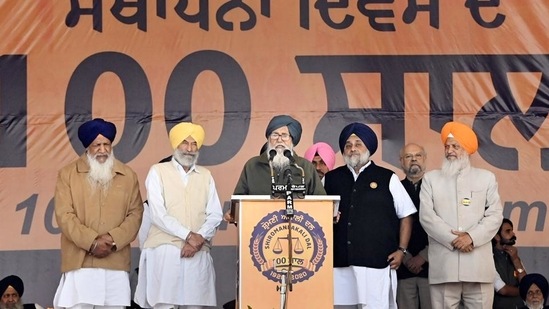 SAD chiefSukhbir Singh Badal with former Punjab chief minister Parkash Singh Badal and others, during a rally to celebrate 100th anniversary of SAD, in Moga on Tuesday. (PTI)