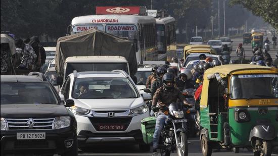 With a population of over 12 lakh and 15 lakh registered vehicles, Chandigarh has the highest density of vehicles per household in the country, leading to traffic congestion. (HT File Photo)