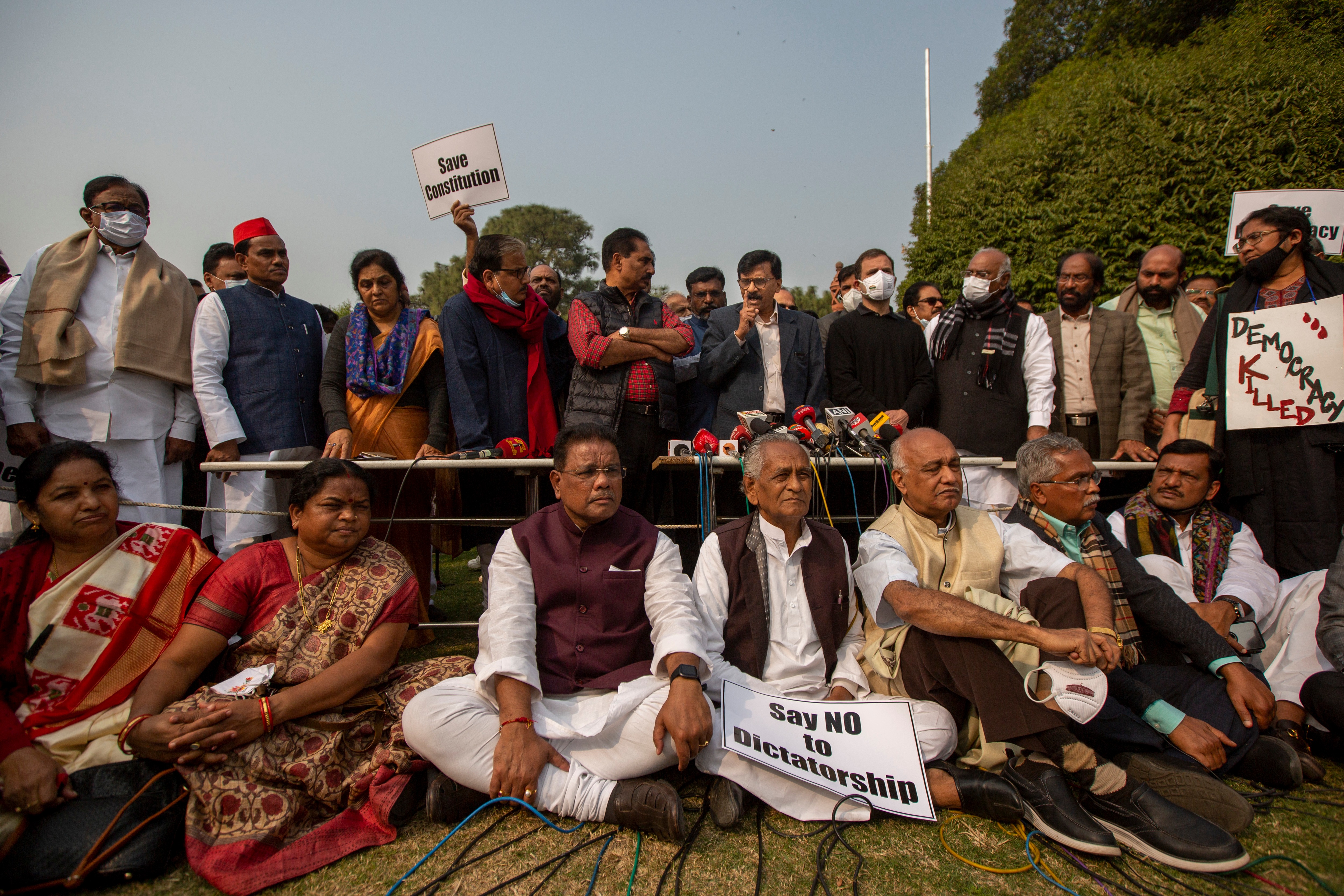 Shiv Sena MP Sanjay Raut addresses media in presence of Opposition MPs outside Parliament on Tuesday. (AP) Shiv Sena MP Sanjay Raut addresses media in presence of Opposition MPs outside Parliament on Tuesday. (AP)