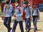 Civic schools for classes 1 to 7 reopen in Mumbai;students welcomed with flowers Civic schools for classes 1 to 7 reopen in Mumbai;students welcomed with flowers