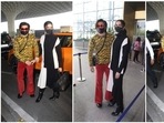 Ranveer Singh and Deepika Padukone have always managed to make heads turn whenever they step out. While the former loves experimenting with his clothing and opts for vibrant popping colours, the latter is always red carpet ready in her chic attire. Recently, the couple was spotted at the airport wearing fancy fits.(HT Photo/Varinder Chawla)