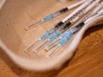 Syringes carrying doses of the Pfizer Covid-19 vaccine wait to be administered in a vaccination clinic set up at St Columba's Church in Sheffield, UK(AFP) Syringes carrying doses of the Pfizer Covid-19 vaccine wait to be administered in a vaccination clinic set up at St Columba's Church in Sheffield, UK(AFP)