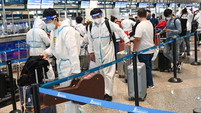 The four international airports in Tamil Nadu are conducting RT-PCR tests for passengers from high-risk countries on arrival. (AFP PHOTO.)