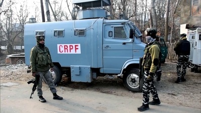 Security personnel stand guard at an encounter site in Pulwama. (ANI File Photo)