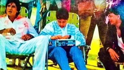 Amitabh Bachchan with Abhishek Bachchan and Mithun Chakraborty.