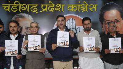 Congress leaders releasing the party manifesto ahead of the Chandigarh MC polls, on Wednesday. (HT Photo) Congress leaders releasing the party manifesto ahead of the Chandigarh MC polls, on Wednesday. (HT Photo)