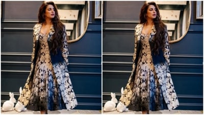 Priyanka accessorised her look with an oversized blazer of the same print. (Instagram/@priyankachopra)