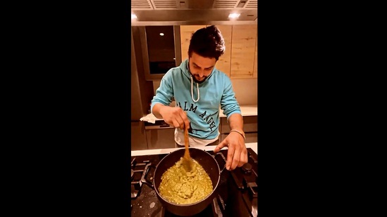 The image taken from the Instagram video shows Suresh Raina preparing sarson ka saag.(Instagram/@sureshraina3)