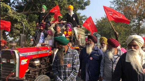 Members of Jamhoori Kisan Sabha, Punjab, taking out a rally before culmination of the protest outside Adani Group’s dry port in Kila Raipur, Ludhiana, on Wednesday. (HT Photo)