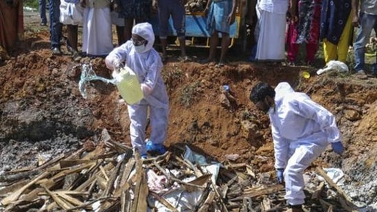 A file photo of health workers preparing to light a fire after culling ducks following the detection of bird flu among domestic birds in Alapuzha district of Kerala.&nbsp;(AP Photo)