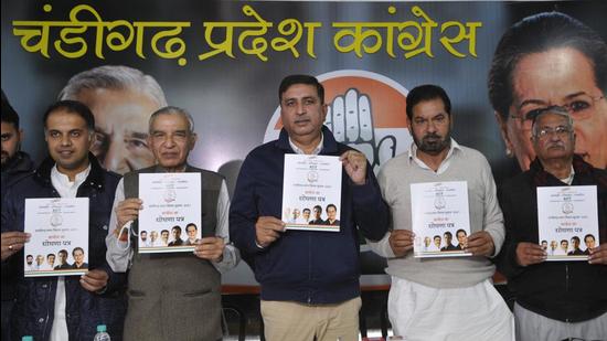Congress leaders releasing the party manifesto ahead of the Chandigarh MC polls, on Wednesday. (HT Photo)
