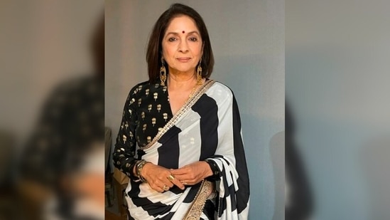 Neena Gupta redefines elegance as she poses for the camera in her beautiful black and white saree.(Instagram/@masabagupta)