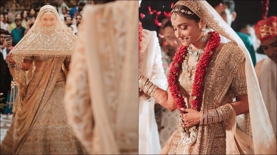 Photo of classic red bridal lehenga with unique gold embroidery