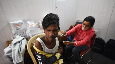 So far, around 14.5 million people in Delhi have got at least one shot of a vaccine, showed CoWin data, which means the city is days away from inoculating every adult with at least one dose. (Sanchit Khanna/HT PHOTO) So far, around 14.5 million people in Delhi have got at least one shot of a vaccine, showed CoWin data, which means the city is days away from inoculating every adult with at least one dose. (Sanchit Khanna/HT PHOTO)