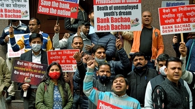 Bank employees holding placards raise slogans during a protest as part of a two-day nationwide strike called by the United Forum of Bank Unions (UFBU) against the Central Government's decision to privatize public sector banks (PSBs), in New Delhi. (ANI )