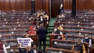 Opposition MPs sloganeering in the Well of Lok Sabha demanding the resignation of Minister of State (MoS) for Home Affairs Ajay Misra Teni over Lakhimpur Kheri incident during the Winter Session of Parliament, in New Delhi on Thursday. (ANI) Opposition MPs sloganeering in the Well of Lok Sabha demanding the resignation of Minister of State (MoS) for Home Affairs Ajay Misra Teni over Lakhimpur Kheri incident during the Winter Session of Parliament, in New Delhi on Thursday. (ANI)