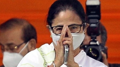 West Bengal chief minister Mamata Banerjee greets Trinamool Congress (TMC) candidates at a public meeting ahead of Kolkata Municipal Election, in Kolkata on Wednesday. (ANI Photo) West Bengal chief minister Mamata Banerjee greets Trinamool Congress (TMC) candidates at a public meeting ahead of Kolkata Municipal Election, in Kolkata on Wednesday. (ANI Photo)