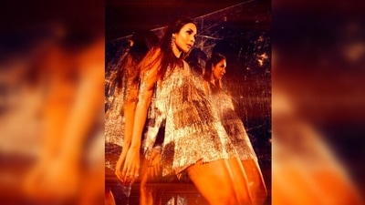 Malaika Arora teamed her look with a pair of shimmery high-heel gladiators with multiple straps. (Instagram/@manekaharisinghani) Malaika Arora teamed her look with a pair of shimmery high-heel gladiators with multiple straps. (Instagram/@manekaharisinghani)