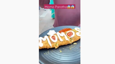 The image taken from the video shows the fusion dish momo paratha. (YouTube/Foodie Incarnate)