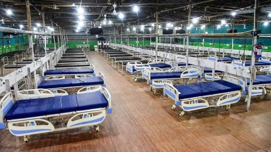 A 110-bed quarantine facility being set up inside Patliputra Sport Complex, amid fear of spread of Omicron variant of Covid-19, in Patna on Wednesday. (PTI)
