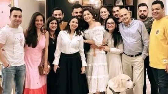 Anushka Sharma, Virat Kohli with their family and friends.