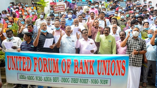 &nbsp;Bank employees raise slogans as they stage a protest in front of UCO Bank main office, as part of the two-day nationwide strike called by the United Forum of Bank Unions against privatization of public sector banks in Puducherry,&nbsp;(PTI)
