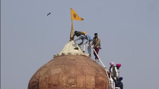 Despite raids across different states such as Delhi, Punjab and Haryana, police was never able to arrest Jugraj Singh -- the man who allegedly hoisted a religious flag at the Red Fort (AP) Despite raids across different states such as Delhi, Punjab and Haryana, police was never able to arrest Jugraj Singh -- the man who allegedly hoisted a religious flag at the Red Fort (AP)