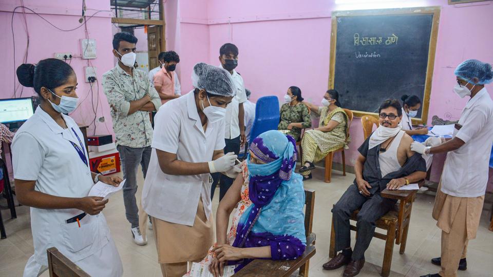 Beneficiaries receive Covid-19 vaccine shots at a vaccination centre. (HT_PRINT)