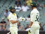 Australia's Michael Neser and Mitchell Starc