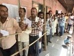 The bill proposes an amendment of section 23 of the RP Act, 1950, allowing the linking of electoral roll data with the Aadhaar ecosystem to “curb the menace of multiple enrollment of the same person in different places”.(HT File) The bill proposes an amendment of section 23 of the RP Act, 1950, allowing the linking of electoral roll data with the Aadhaar ecosystem to “curb the menace of multiple enrollment of the same person in different places”.(HT File)