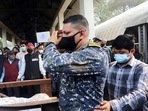 Late Group Captain Varun Singh's brother Navy Lt Commander Tanuj Singh and son Radduman Singh perform the last rites during his cremation, in Bhopal on Friday. (ANI) Late Group Captain Varun Singh's brother Navy Lt Commander Tanuj Singh and son Radduman Singh perform the last rites during his cremation, in Bhopal on Friday. (ANI)
