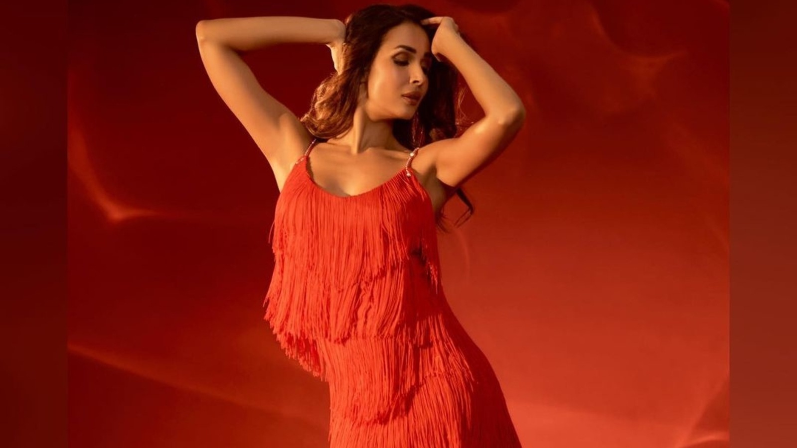 Malaika Arora lays sultry cues this Christmas in ₹60k red strappy