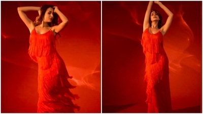Red is a colour that can make anyone stand out and grab eyeballs. Fashionista Malaika Arora, whose Instagram account is screaming all things stylish and glamorous, was recently spotted wearing a stunning red long fringe dress. (Instagram/@manekaharisinghani) Red is a colour that can make anyone stand out and grab eyeballs. Fashionista Malaika Arora, whose Instagram account is screaming all things stylish and glamorous, was recently spotted wearing a stunning red long fringe dress. (Instagram/@manekaharisinghani)