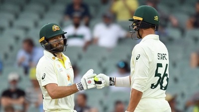 Australia's Michael Neser and Mitchell Starc (REUTERS)