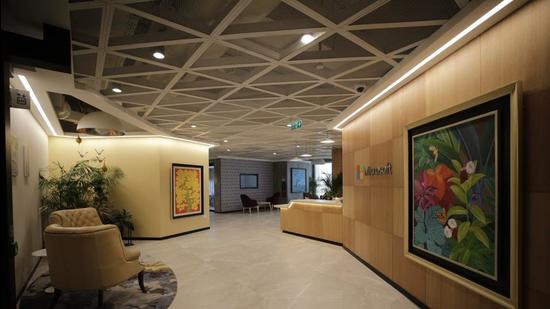 Wide open corridors in Microsoft’s new office are fitted with vibrant murals depicting the region’s flora and fauna. (Sourced)