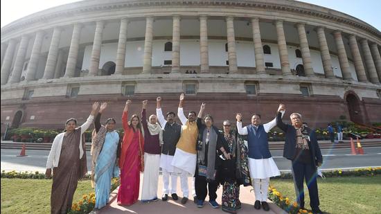 Suspended Rajya Sabha MPs during a protest at Parliament House, in New Delhi, on Friday. (PTI)
