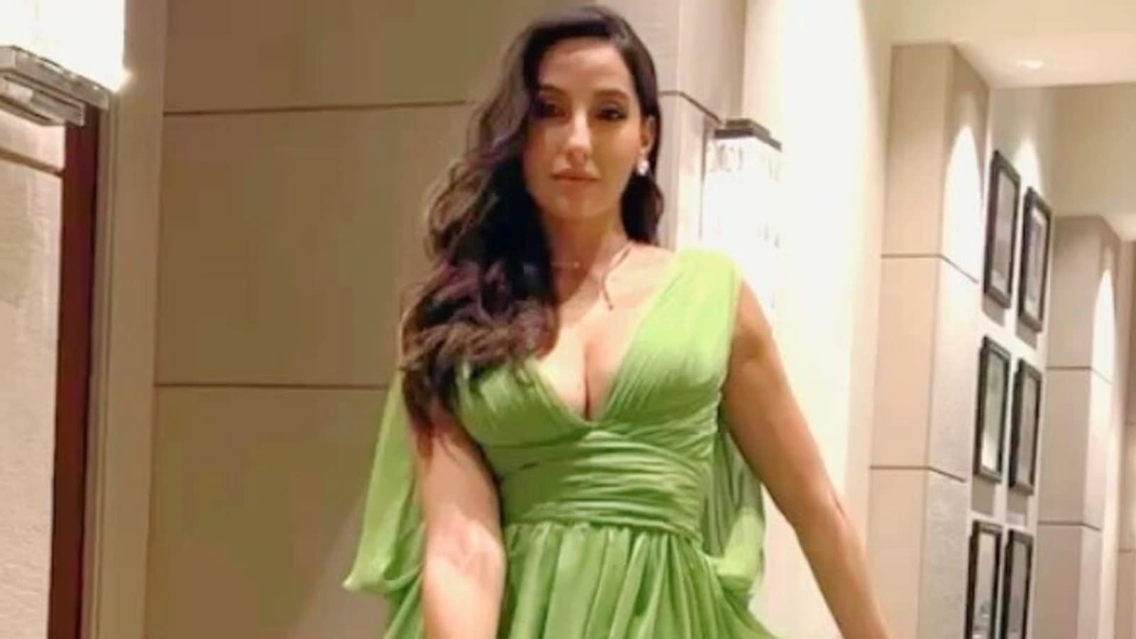 Nora Fatehi Makes A Fashion Statement In A Green Shimmery Dress