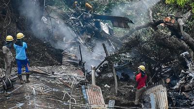 Chief of defence staff (CDS) General Bipin Rawat and 13 others were killed in a Mi-17V5 crash near Coonoor in Tamil Nadu. Those killed included the only survivor of the crash, Group Captain Varun Singh, who died on Wednesday after battling for his life for a week. The others died instantly on December 8. (AFP PHOTO.)