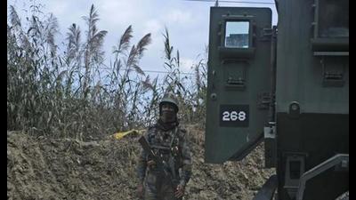 A soldier stands guard on a highway on the outskirts of Kohima, capital of Nagaland, December. 5, 2021. Angry villagers burned army vehicles in protest after more than a dozen people were killed by soldiers who mistakenly believed some of them were militants (AP) A soldier stands guard on a highway on the outskirts of Kohima, capital of Nagaland, December. 5, 2021. Angry villagers burned army vehicles in protest after more than a dozen people were killed by soldiers who mistakenly believed some of them were militants (AP)
