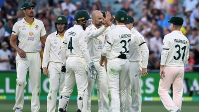 Australia's Nathan Lyon celebrates taking the wicket of England's Ollie Robinson with teammates (REUTERS)