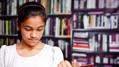 Put away your mobile phones after dinner time and instead sit with your children with a book in hand and see the difference. (Representative Image/HT File)
