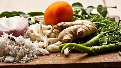 Ginger and Garlic: Add them to your curries or soup to reap benefits of these popular kitchen ingredients. Due to its anti-inflammatory, antiseptic and anti-gastric properties, ginger helps boost digestion and keeps stomach issues at bay. Garlic contains allicin, which contains organosulfur compounds that boost your immune response. Eating garlic daily can help you fight a cold, cough, flu and other infections that commonly occur in winter. (Pixabay) Ginger and Garlic: Add them to your curries or soup to reap benefits of these popular kitchen ingredients. Due to its anti-inflammatory, antiseptic and anti-gastric properties, ginger helps boost digestion and keeps stomach issues at bay. Garlic contains allicin, which contains organosulfur compounds that boost your immune response. Eating garlic daily can help you fight a cold, cough, flu and other infections that commonly occur in winter. (Pixabay)