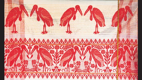 As part of its mission, the Hargila Army weaves the stork motif into traditional Assamese garments such as gamchas.